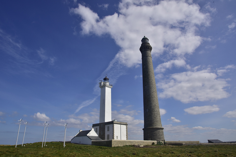 Lighthouse and wind turbines